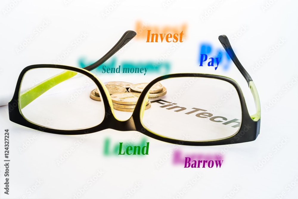 FINTECH concept image. US. Eye glasses and money coins with words of its benefit of fintech on white background. FINTECH concept image. US. Eye glasses and money coins with words of its benefit of fintech on white background.