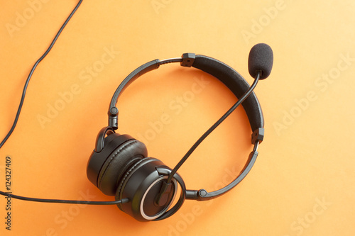 Headset with microphone on orange