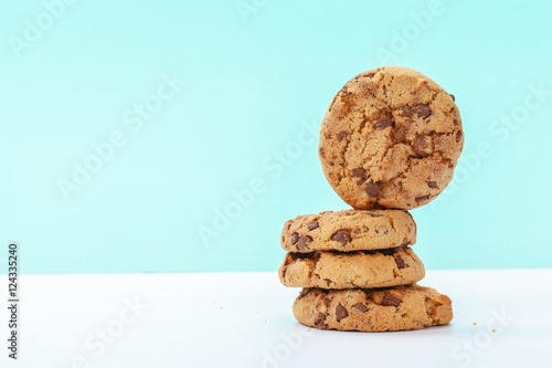 chocolate chunk cookies on a bright blue background