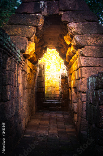 tunnel  golden light in rock castle ancient