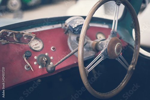 Close up on steering wheel, Classic car interior © Kittiphan