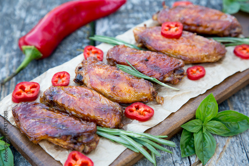 Baked spicy chicken wings in the Asian style