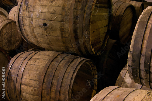 several wooden barrels closeup