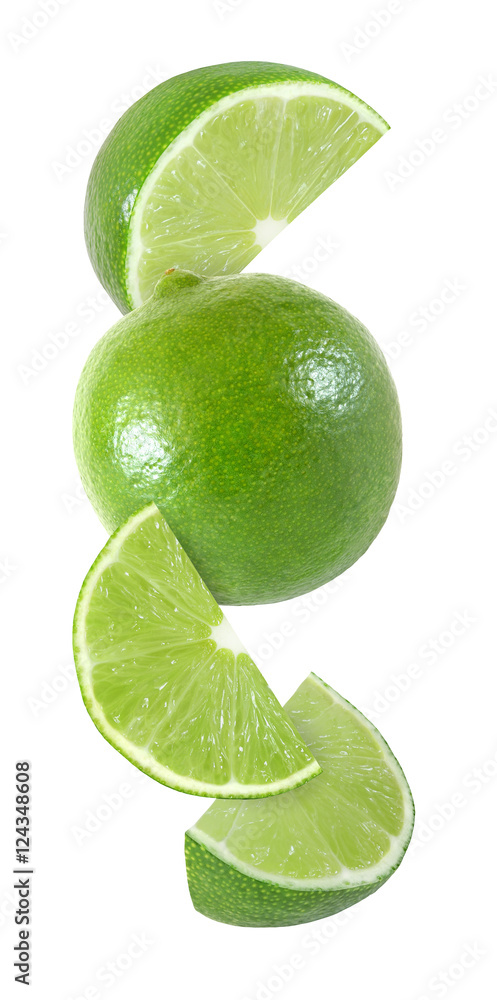 hanging, falling and flying piece of lime fruits isolated on white background with clipping path