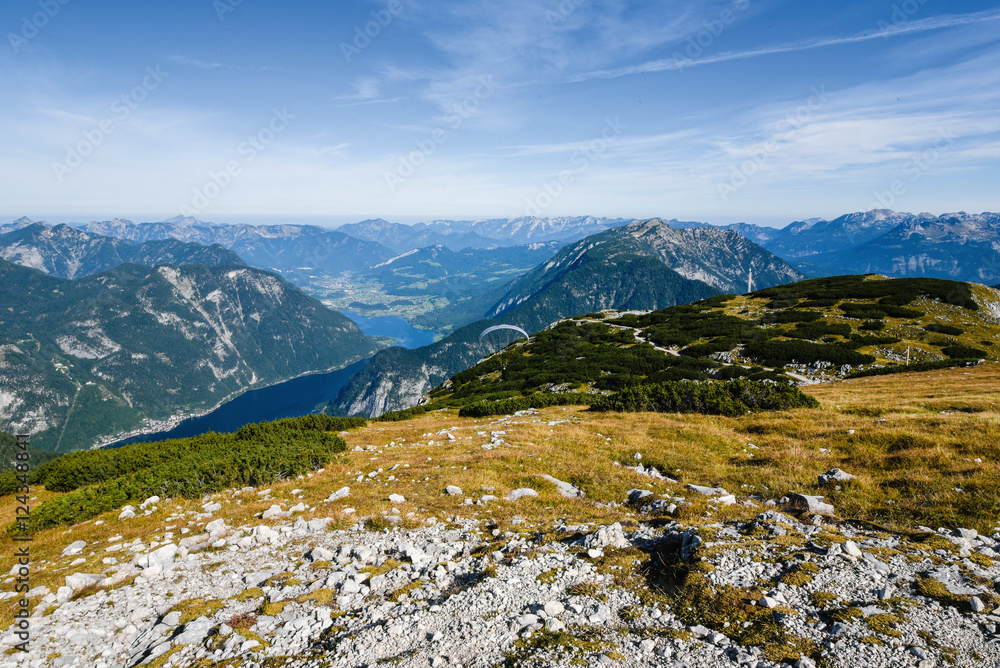 panoramic view with paragliding at dachstein glacier, austria