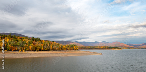 Ashokan Reservoir in the Catskills with Fall Colors and Dramatic Sky in the Mid-Hudson Valley. Reservoir is part of the NYC water supply, a destination for hikers and a home for Eagles. photo