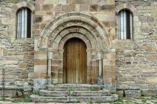 front of the Romanesque church of St Martin Bishop in the Salcedillo town in Palencia  Castile and Le  n  Spain