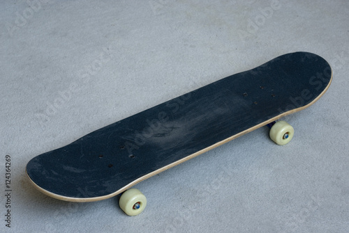 Black Skateboard On Ground