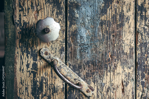 Old wooden door with lock and handle