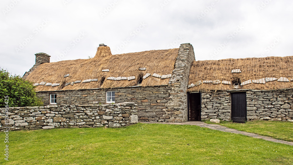 Dunrossness Croft House Museum in the Main Shetland Island northeast of the mainland of Scotland, United Kingdom,which depicts 19th Century Shetland family life Dunrossness Croft House Museum in the Main Shetland Island northeast of the mainland of Scotland, United Kingdom,which depicts 19th Century Shetland family life