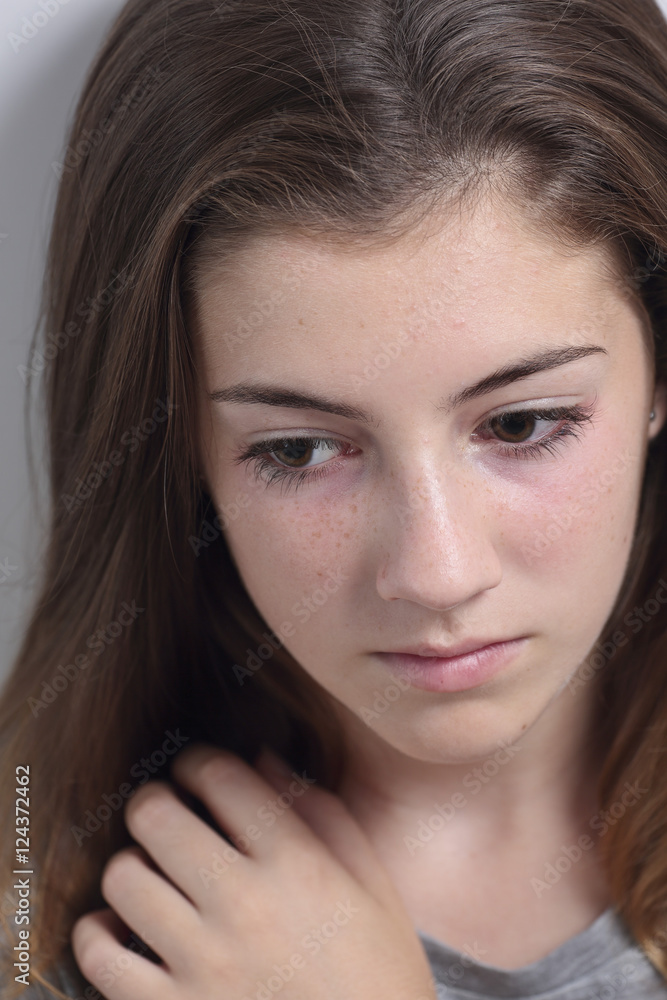 Portrait of a teenager with a serious face. Portrait of a teenager with a serious face.