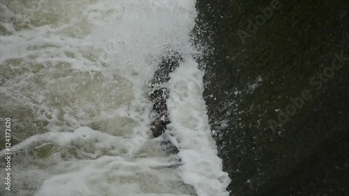 Wallpaper Mural Rushing water spillway at alow head dam after heavy rain, Westerville, Ohio/USA on June 12, 2014. Torontodigital.ca