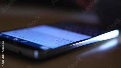 generic brand mobile phone texting typing reading scrolling watching pictures close up modern technology smartphone