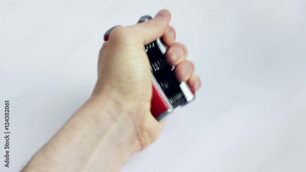 Close-up on a Hand performing Hand Grip Exercise Close-up on a Hand performing Hand Grip Exercise