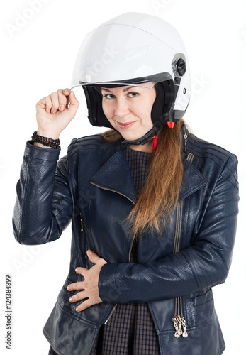 Cheerful Caucasian woman in leather jacket and white motorcycle helmet, isolated on white background © Kekyalyaynen