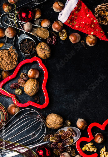 Christmas baking background - cookie cutters, spices, nuts, Holiday decorations