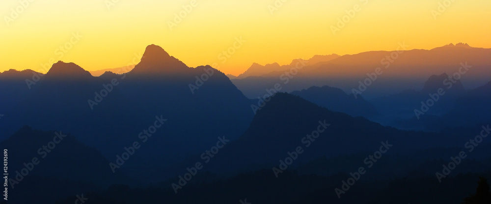 Majestic sunset in the mountains landscape. Dramatic sky.