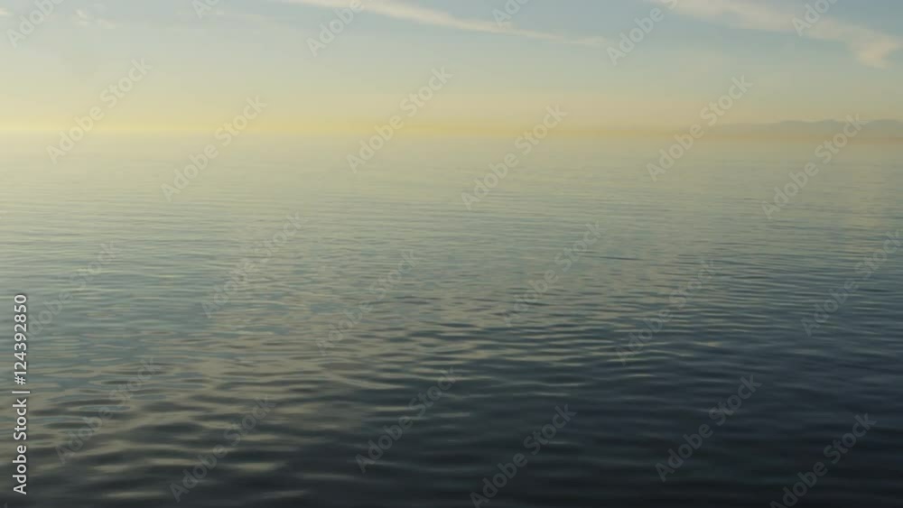 Ocean with mist and mountains in distance. Ocean with mist and mountains in distance.