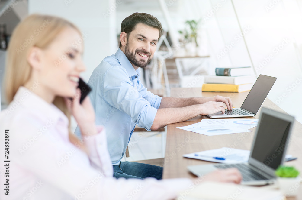 Successful workers are typing on computers Successful workers are typing on computers