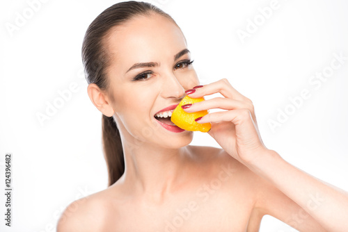 Pretty woman enjoying healthy fruit