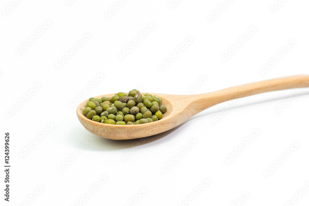 mung beans over wooden spoon isolated on white mung beans over wooden spoon isolated on white