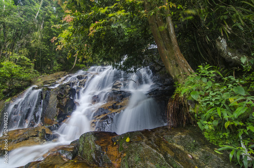 Fototapeta Naklejka Na Ścianę i Meble -  beautiful in nature, amazing cascading tropical waterfall. wet a