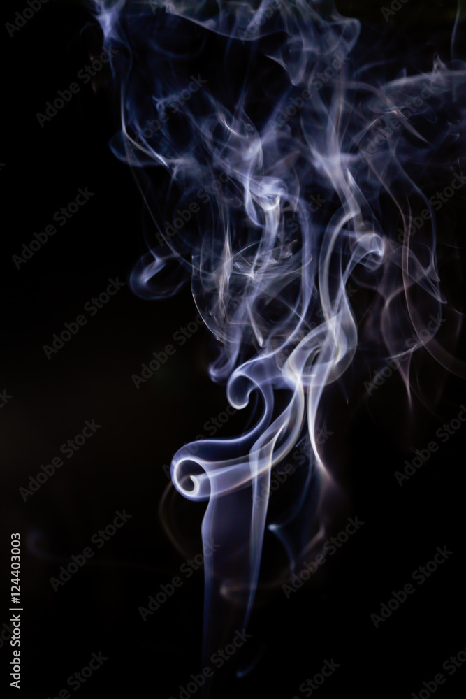 White smoke movement on black background. White smoke movement on black background.