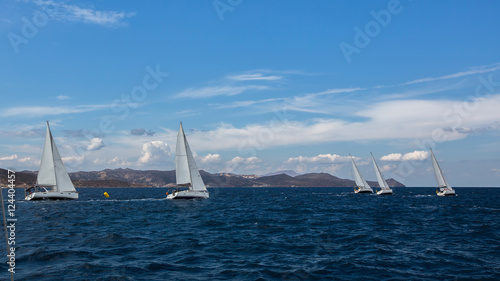 Luxury yachts at Sailing regatta. Yachting in the wind through the waves at the Sea.