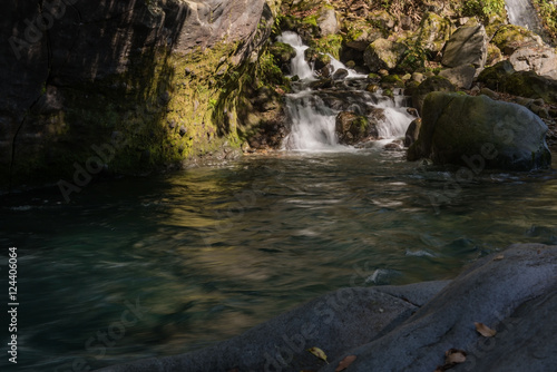 Fototapeta Naklejka Na Ścianę i Meble -  Nature waterfall in the forest water stream.