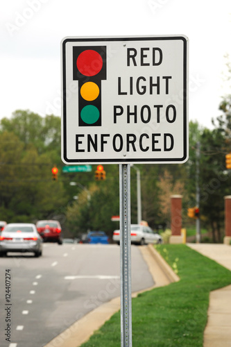 traffic light and red light photo enforced sign in the street