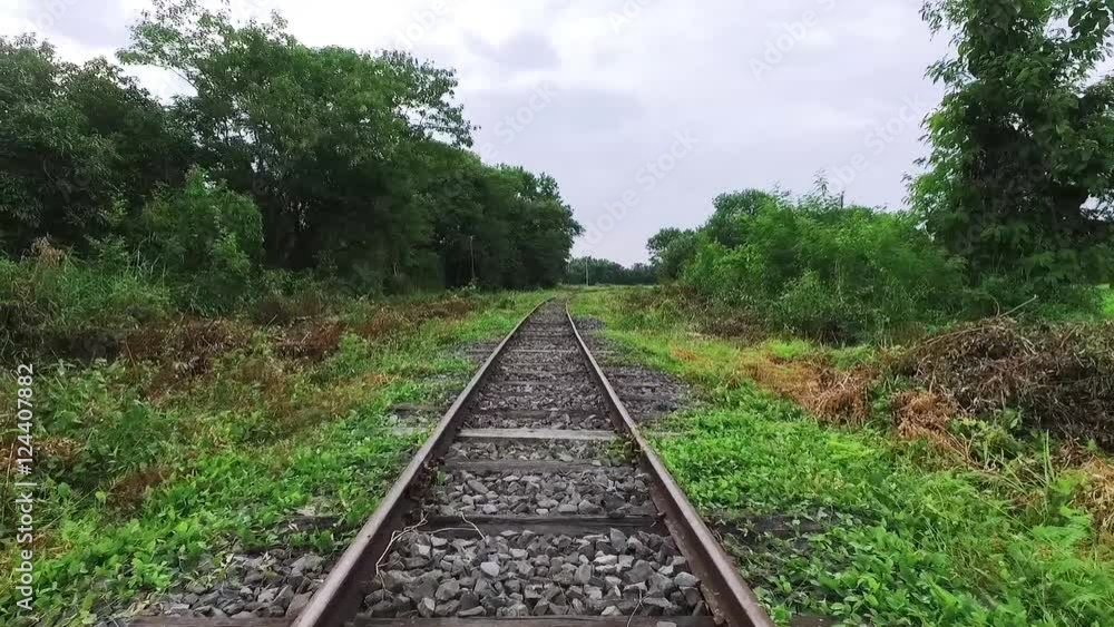 Walk along abandoned railway beside the forest in first person view Walk along abandoned railway beside the forest in first person view
