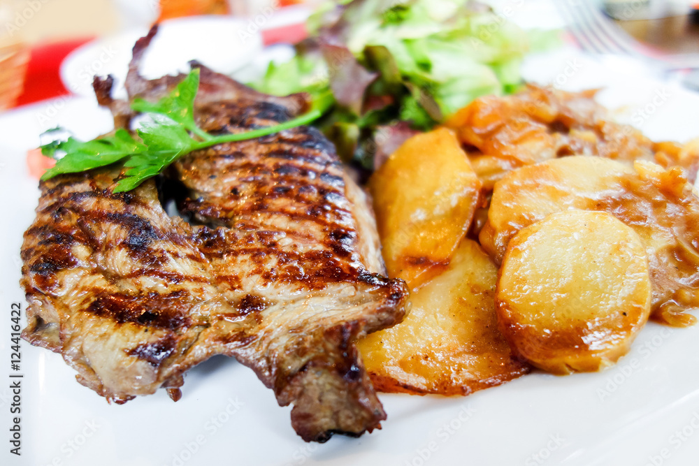 juicy steak beef meat with tomato and french fries juicy steak beef meat with tomato and french fries
