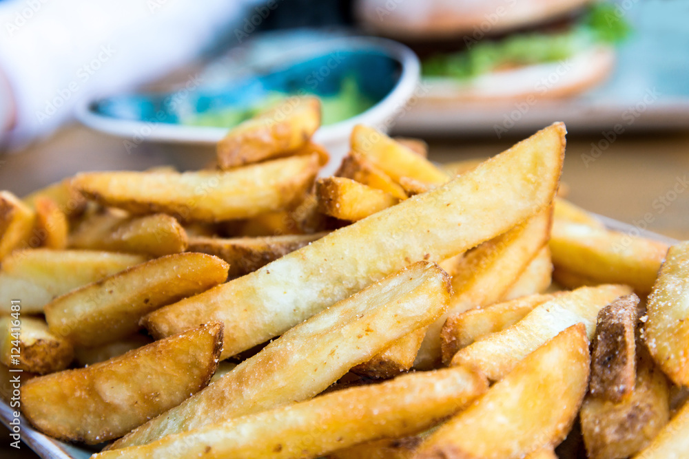 Golden French fries potatoes ready to be eaten Golden French fries potatoes ready to be eaten