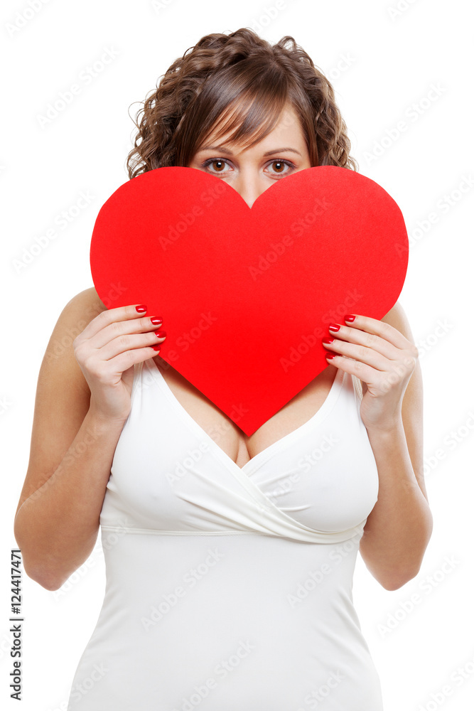 Young woman holding red paper heart Young woman holding red paper heart