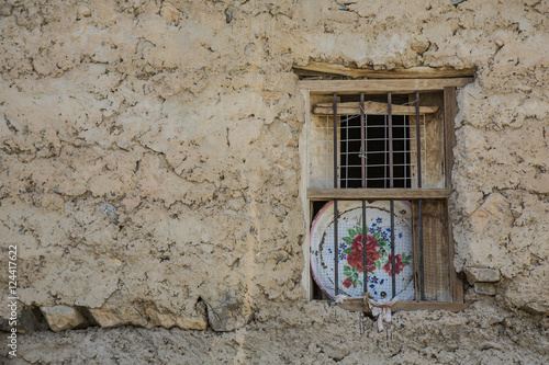 window in Wakan village in Oman photo