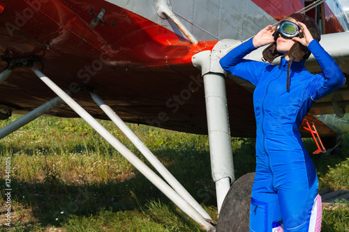 attractive woman pilot on the outdoors © Ruslan Solntsev