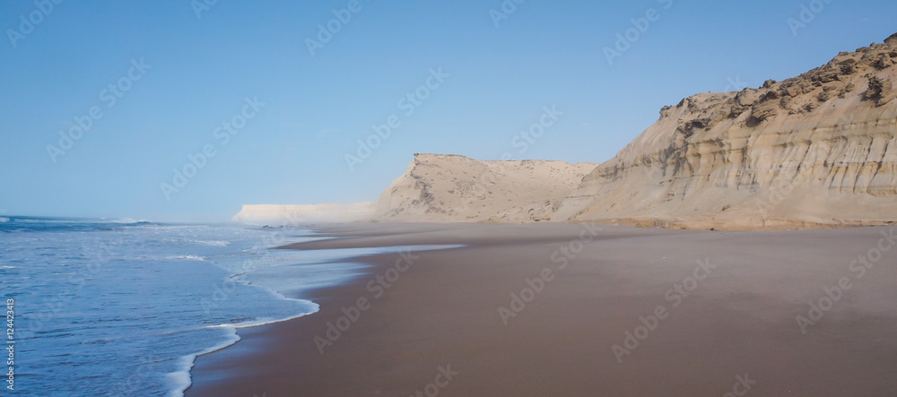 sand cliffs of Dakhla in Western Sahara region of Morocco, with sea sand cliffs of Dakhla in Western Sahara region of Morocco, with sea