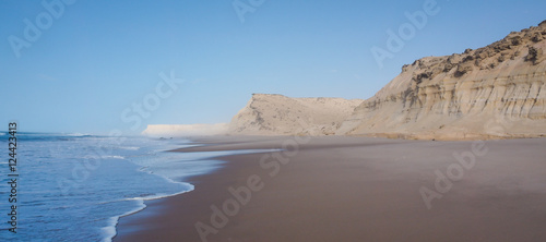 sand cliffs of Dakhla in Western Sahara region of Morocco, with sea photo