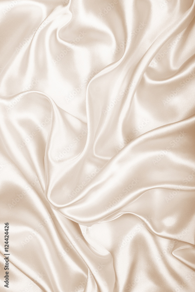 Obraz premium Smooth elegant golden silk as wedding background. In Sepia toned