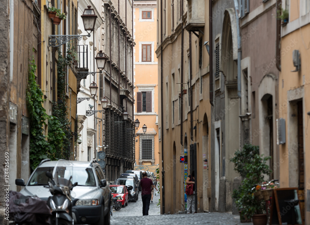 Typical old and narrow street in Rome. Italy