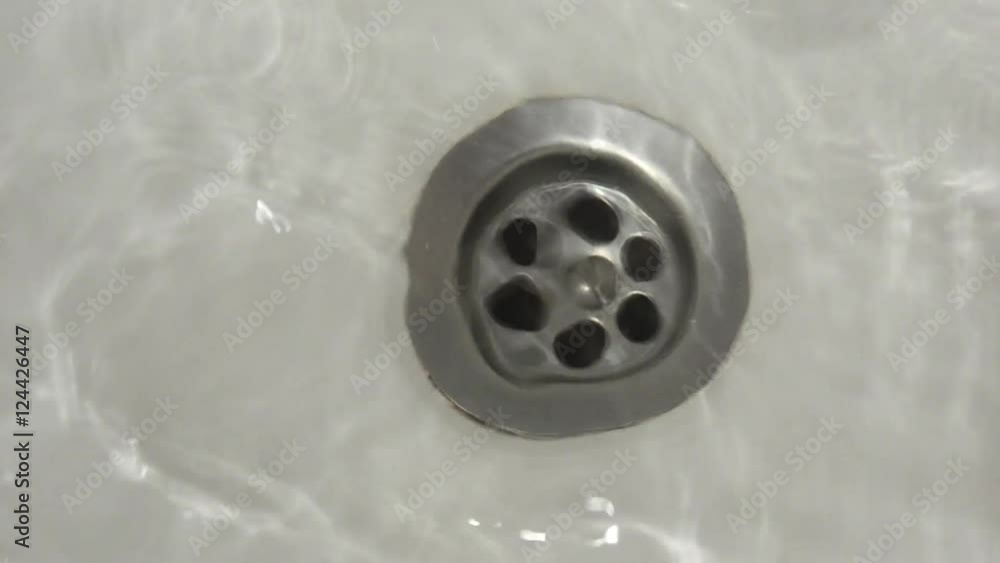 Sink into which water flows Sink into which water flows