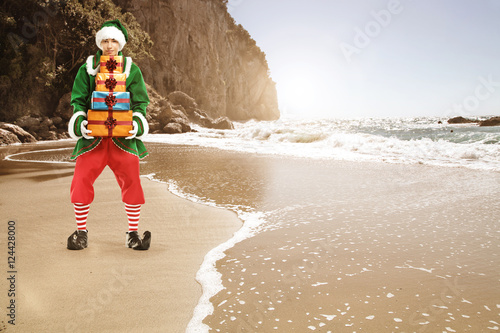elf and christmas time on beach 