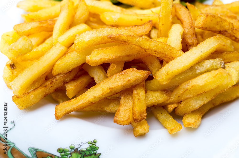 Golden French fries potatoes ready to be eaten Golden French fries potatoes ready to be eaten