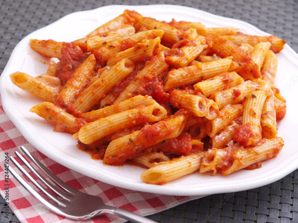 Penne pasta with tomatoes sauce. Horizontal shot Penne pasta with tomatoes sauce. Horizontal shot