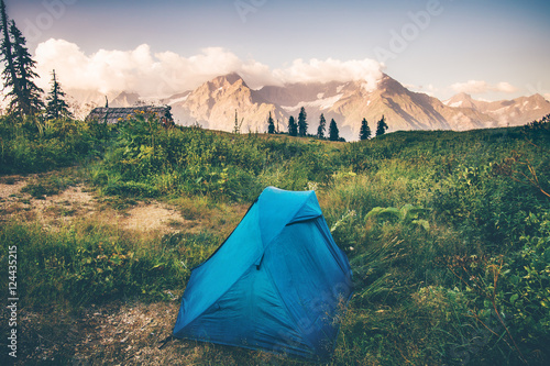 Tent camping with Rocky Mountains Landscape Travel Lifestyle concept Summer adventure vacations outdoor