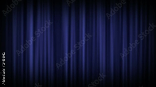 Background lighting effect of a light shining on a closed velvet curtain such as used in a cinema
