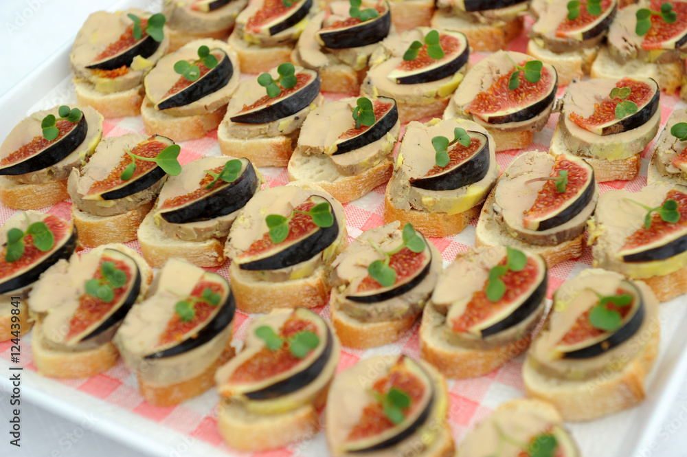 Crostini with foie gras canape and slices of fig
Crostini with foie gras canape and slices of fig