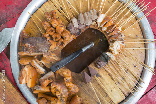 Bild auf Leinwand Myanmar street food, Pork offal skewers with hot soup