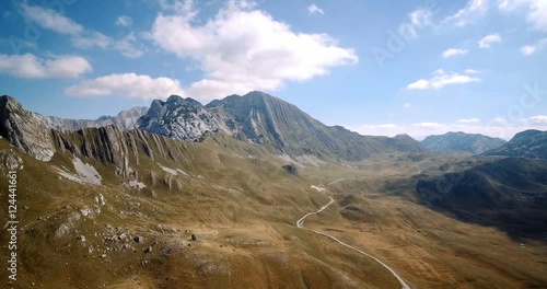 Aerial, Amazing Mountains In Durmitor National Park, Montenegro - Graded and stabilized version. Watch also for the native material, straight out of the camera. photo