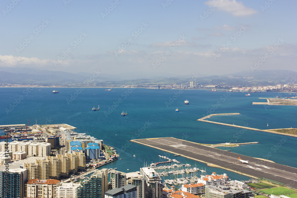Aerial view of the port, city and Bay of Gibraltar located at the southern end of the Iberian Peninsula. Taken from the Great Siege Tunnels at the top of the Rock.
